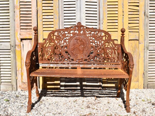 A cast iron garden bench,