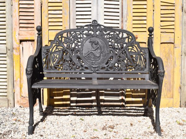 A cast iron garden bench