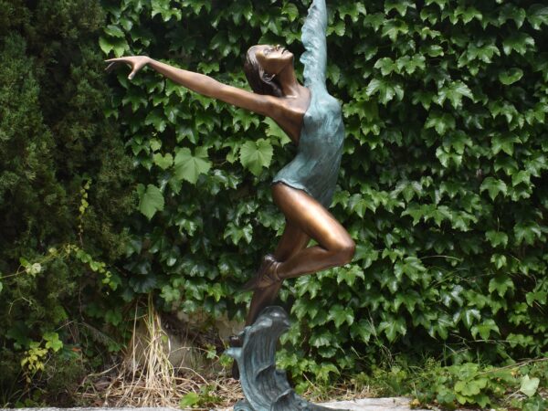 A bronze sculpture of a leaping Ballerina