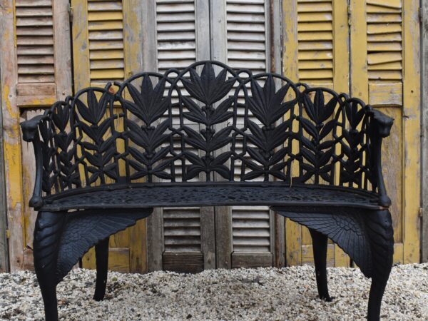 a black painted Coalbrookdale style cast iron Fern pattern bench,