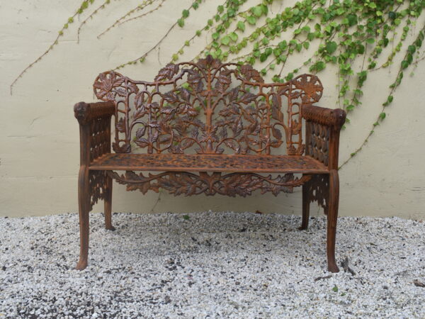 A cast iron Coalbrookdale style Oak and Ivy pattern bench,