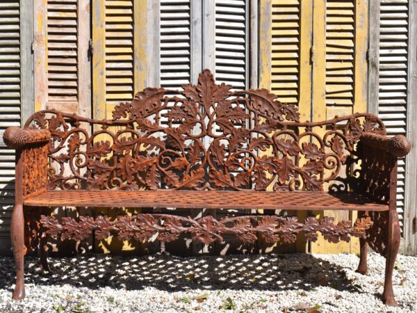 A lovely cast iron Coalbrookdale style oak leaf pattern bench.