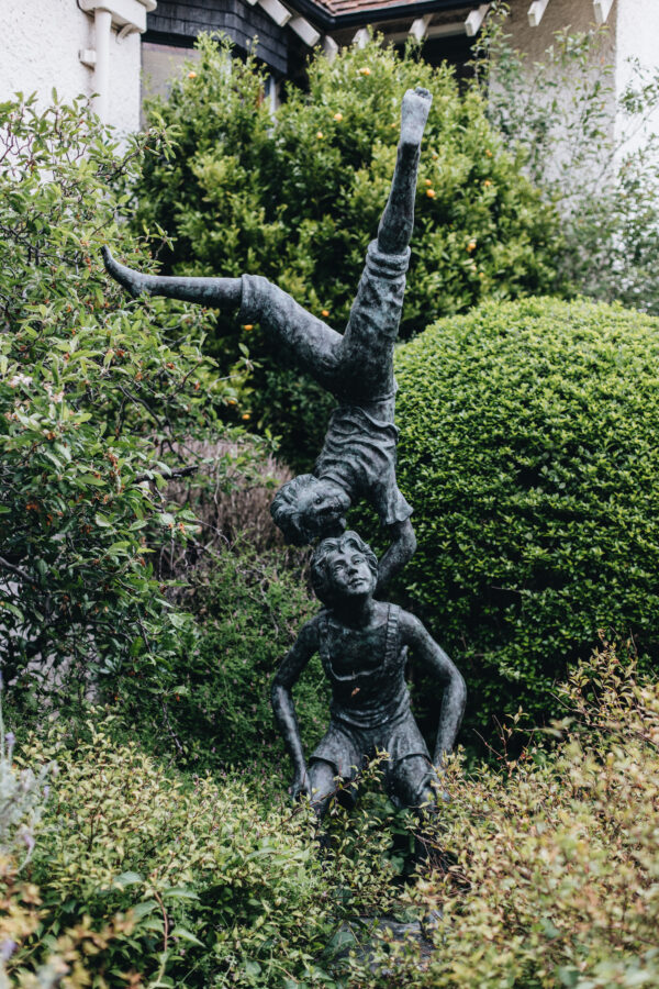 A wonderful bronze statue of a pair of acrobats, - The Old Pot Factory