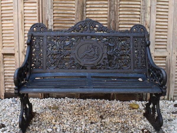 A cast iron garden bench