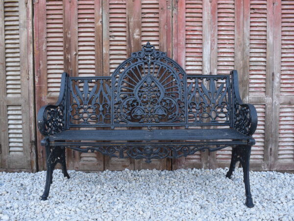 A Peacock pattern Coalbrookdale style cast iron bench