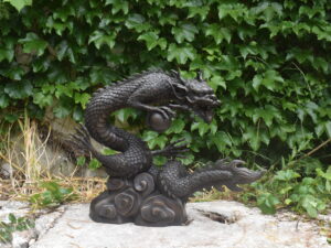 a bronze dragon, plumbed as a fountain.