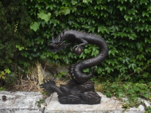 a bronze dragon, plumbed as a fountain.