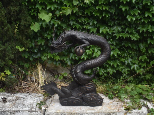 a bronze dragon, plumbed as a fountain.