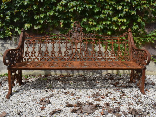 a Gothic pattern Coalbrookdale style cast iron bench