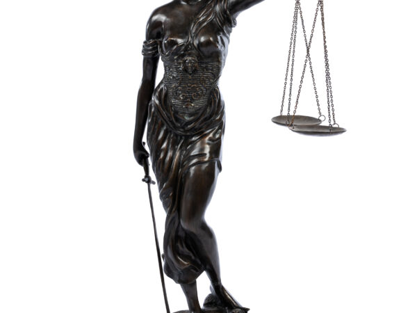 A bronze statue of Lady Justice