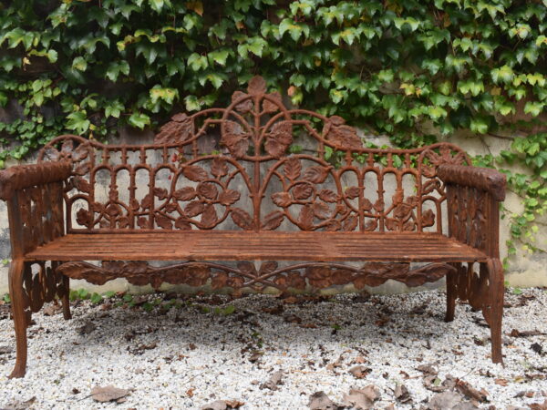 A cast iron Coalbrookdale style Oak and Ivy pattern bench,