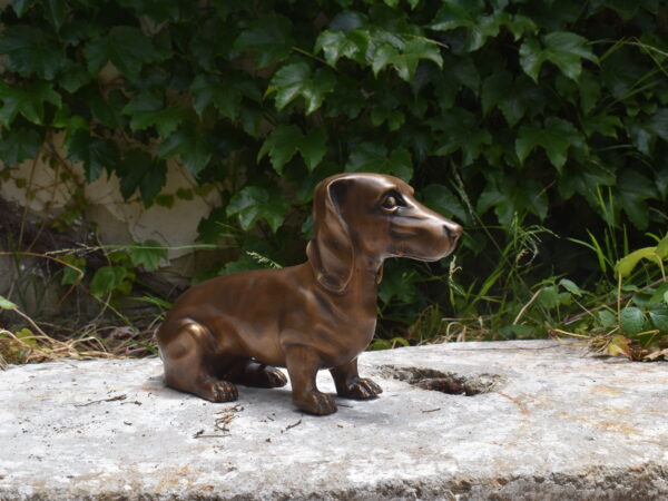 A bronze Dachshund