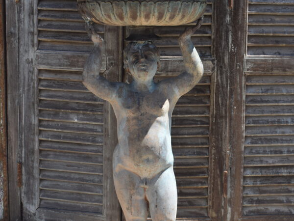 A bronze cherub statue/fountain