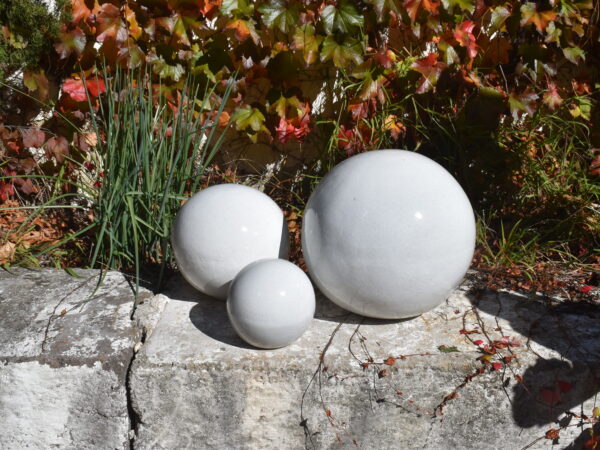 White glazed ceramic spheres with flat bottom