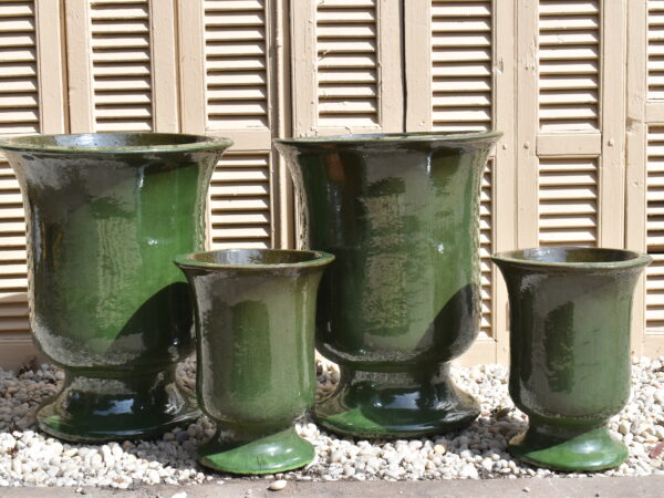 A Glazed Olive Green Glazed Rheims style urn