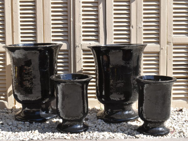 A glazed black glazed Rheims style urn